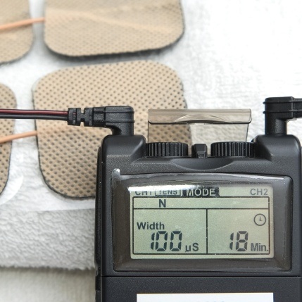 T M J therapy system