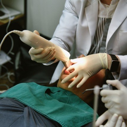 Dentist capturing digital impressions