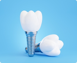 Model of two dental implants with dental crowns