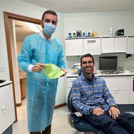 Doctor Homsi and dentistry patient in dental office