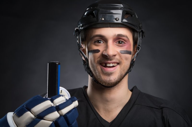 Hockey player missing a tooth