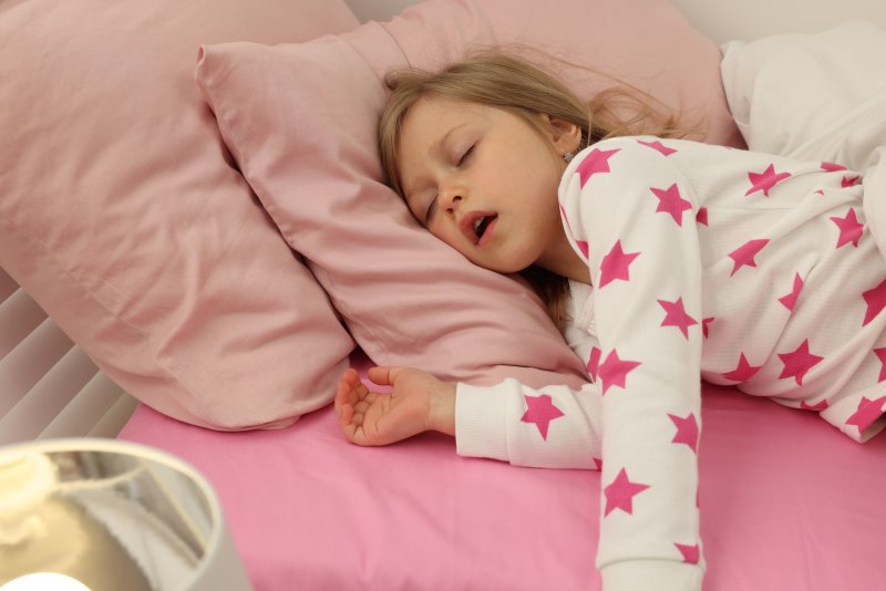 little girl breathing with her mouth open